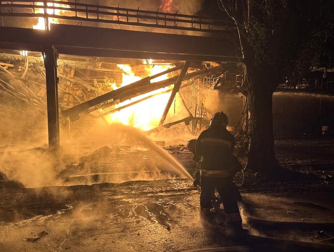 Firefighters work at an oil refinery which was hit during Russia's drone attacks in Kremenchuk, Poltava region, Ukraine November 1, 2023. Head of the Poltava Regional Military Administration Filip Pronin/Handout via REUTERS